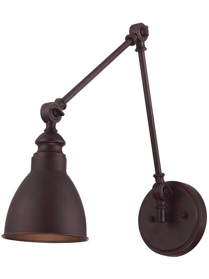 Dakota Adjustable Wall Sconce in English Bronze.